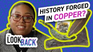Smiling person with glasses beside text “HISTORY FORGED IN COPPER?” and “The Look Back,” with copper tools and forging scene.
