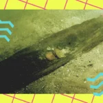 Underwater dugout canoe on lakebed with teal wave graphics and neon grid background.